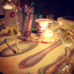 Tablescape at the end of a long, shared meal with my dear friend Marianne. Almost every shared meal at my house has colored pencils (and a colorable table covering) at the center. 